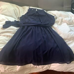 L navy dress, simple but with a cute scallop detail around the arms.
